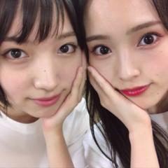 ま な か