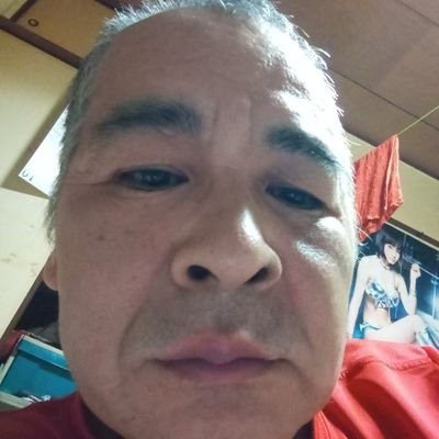 安達一二男